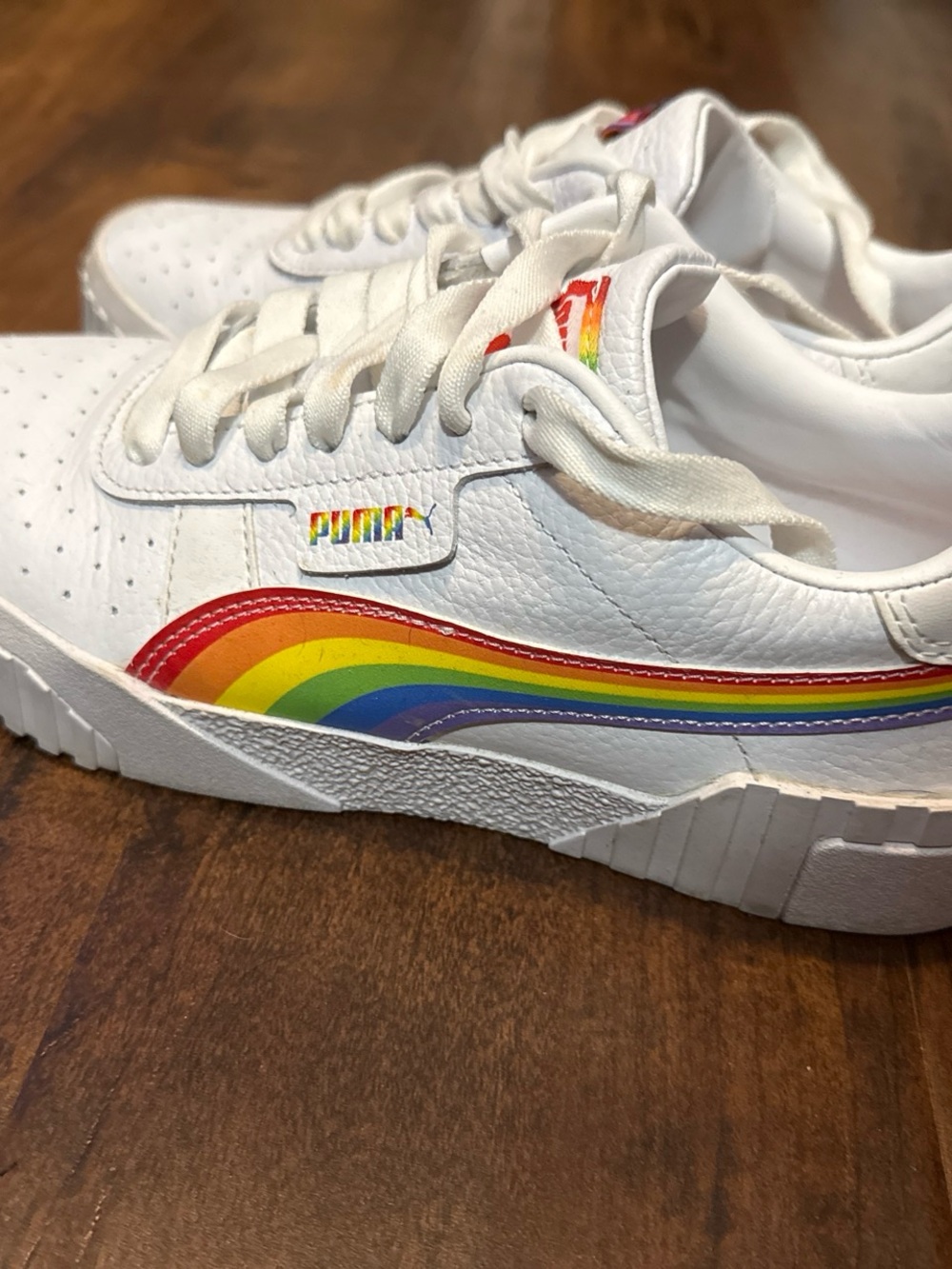 Puma white sneakers with rainbow stripe